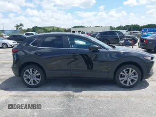 2025 Mazda CX-30 S Preferred with VIN 3MVDMBCM0SM798708, listed as a IAAI auction lot 42133091 with 4,305 mi miles and . Bid and sale history available at DreamBid. Image 13.