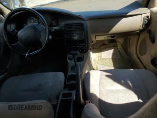 2000 Saturn SL with VIN 1G8ZH5285YZ240565, listed as a Copart auction lot 66567153 with 202,109 mi miles and Salvage title. Bid and sale history available at DreamBid. Image 8.