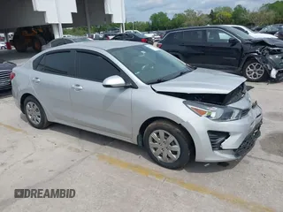 2021 Kia Rio LX with VIN 3KPA24AD1ME372886, listed as a IAAI auction lot 41876332 with 39,665 mi miles. Bid and sale history available at carsss.com. Image 1.