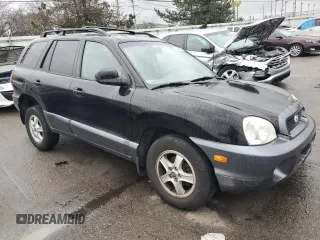 2002 Hyundai Santa Fe with VIN KM8SB12B12U241600, listed as a Copart auction lot 83525334 with 83,032 mi miles and Salvage Title. Bid and sale history available at carsss.com. Image 4.