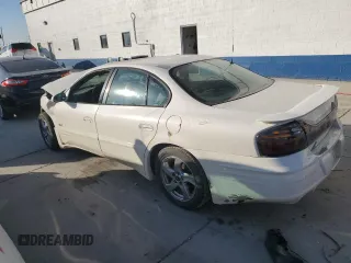 2002 Pontiac Bonneville SLE z VIN 1G2HY54K824158784, wystawiony jako Copart lot #74749224 z przebiegiem Nie podano mil oraz Szkoda całkowita • Salvage title. Historia ofert i sprzedaży dostępna na DreamBid. Obrazek 2.