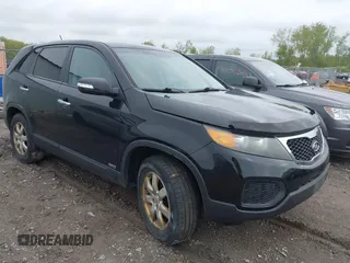 2011 Kia Sorento LX with VIN 5XYKTCA17BG172032, listed as a IAAI auction lot 42227728 with 133,681 mi miles and . Bid and sale history available at carsss.com. Image 1.