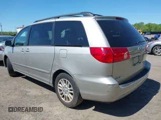 2010 Toyota Sienna XLE with VIN 5TDYK4CC3AS316002, listed as a IAAI auction lot 42138246 with 123,203 mi miles. Bid and sale history available at carsss.com. Image 3.