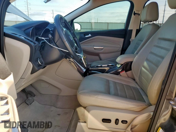 2015 Ford Escape Titanium with VIN 1FMCU0J97FUC88093, listed as a Copart auction lot 60854085 with 64,029 mi miles and Salvage title. Bid and sale history available at DreamBid. Image 7.