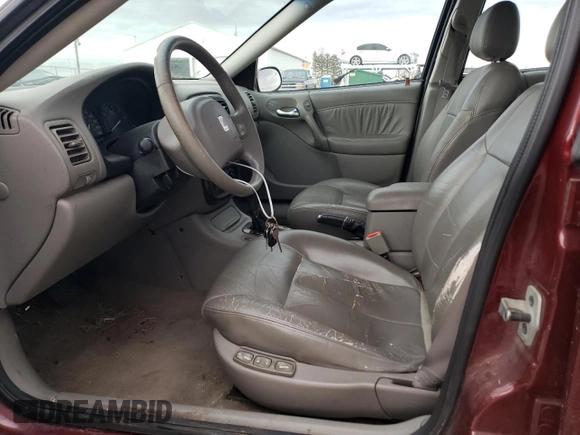 2001 Saturn LW z VIN 1G8JW84R11Y521400, wystawiony jako Copart lot #79285134 z przebiegiem 94 225 mil mil oraz Tytuł czysty. Historia ofert i sprzedaży dostępna na DreamBid. Obrazek 7.