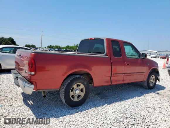 2002 Ford F-150 XL with VIN 1FTRX17202NA40522, listed as a Copart auction lot 58208915 with 100,297 mi miles and Salvage title. Bid and sale history available at DreamBid. Image 3.
