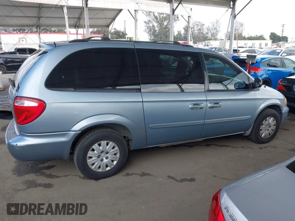 2006 Chrysler Town & Country LX with VIN 1A4GP44R46B609965, listed as a IAAI auction lot 42093438 with 333,689 mi miles and . Bid and sale history available at DreamBid. Image 13.