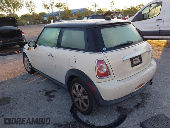 2011 MINI Hardtop with VIN WMWSU3C58BT097825, listed as a IAAI auction lot 42040442 with 141,978 mi miles and . Bid and sale history available at DreamBid. Image 3.