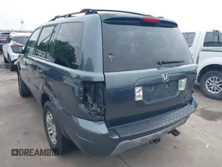 2005 Honda Pilot EX-L with VIN 5FNYF18565B046464, listed as a IAAI auction lot 41879495 with 228,021 mi miles. Bid and sale history available at carsss.com. Image 3.
