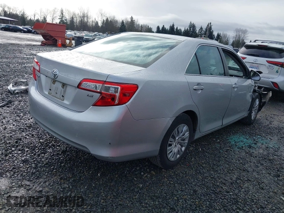 2014 Toyota Camry L with VIN 4T4BF1FK8ER419012, listed as a IAAI auction lot 41819331 with 84,372 mi miles and . Bid and sale history available at DreamBid. Image 4.