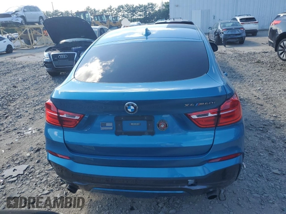 2017 BMW X4 M40i with VIN 5UXXW7C58H0U25599, listed as a Copart auction lot 61489334 with 115,001 mi miles and Salvage Title. Bid and sale history available at carsss.com. Image 6.