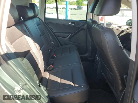 2014 Volkswagen Tiguan SEL with VIN WVGAV3AX8EW585929, listed as a Copart auction lot 61462205 with 63,899 mi miles and Salvage title. Bid and sale history available at DreamBid. Image 11.