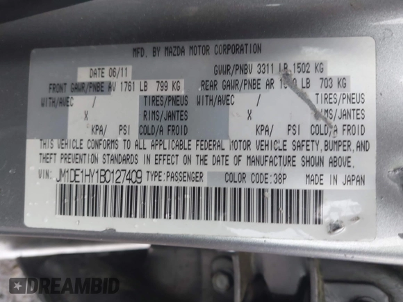 2011 Mazda 2 Sport with VIN JM1DE1HY1B0127409, listed as a IAAI auction lot 42015727 with 154,385 mi miles. Bid and sale history available at carsss.com. Image 9.
