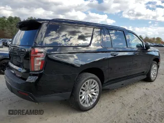 2023 Chevrolet Suburban RST with VIN 1GNSKEKDXPR293788, listed as a Copart auction lot 77902924 with 75,245 mi miles and Salvage title. Bid and sale history available at DreamBid. Image 3.