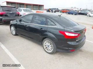 2012 Ford Focus SEL with VIN 1FAHP3H22CL284763, listed as a IAAI auction lot 41824652 with 178,451 mi miles. Bid and sale history available at carsss.com. Image 3.