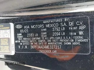 2021 Kia Forte GT-Line with VIN 3KPF34AD4ME327217, listed as a IAAI auction lot 41558540 with 61,518 mi miles and . Bid and sale history available at carsss.com. Image 9.