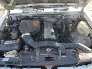 1996 Nissan Frontier XE z VIN 1N6SD11SXTC371962, wystawiony jako Copart lot #52947535 z przebiegiem 256 352 mil mil oraz Czysty tytuł • Clean title. Historia ofert i sprzedaży dostępna na DreamBid. Obrazek 11.