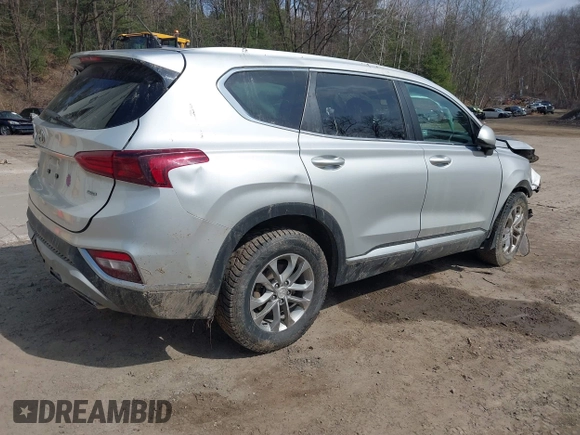 2019 Hyundai Santa Fe SE z VIN 5NMS2CAD5KH115511, wystawiony jako IAAI lot #42017668 z przebiegiem 91 584 mil mil oraz . Historia ofert i sprzedaży dostępna na DreamBid. Obrazek 4.