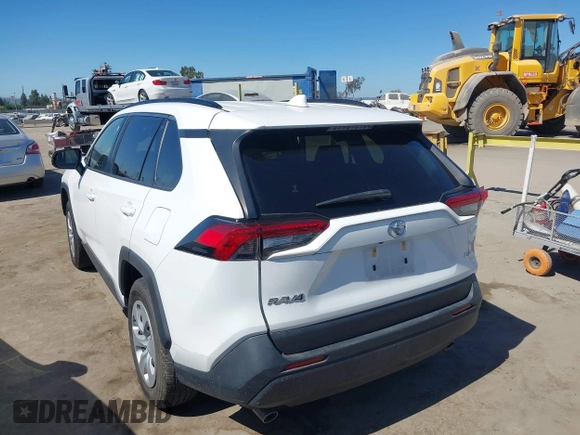 2019 Toyota RAV4 LE with VIN JTMH1RFV4KJ015962, listed as a IAAI auction lot 42714711 with 26,089 mi miles and . Bid and sale history available at DreamBid. Image 3.