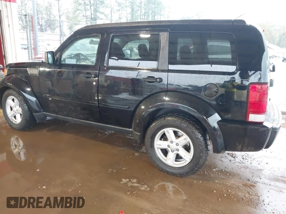 2007 Dodge Nitro SXT with VIN 1D8GT28K67W683600, listed as a IAAI auction lot 40958011 with 70,141 mi miles. Bid and sale history available at carsss.com. Image 3.