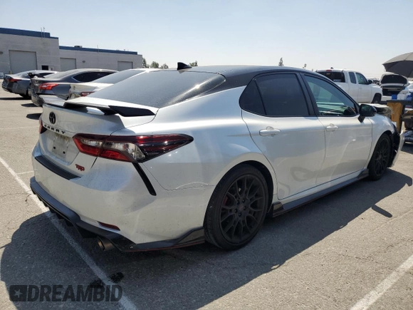 2022 Toyota Camry TRD with VIN 4T1KZ1AK0NU066094, listed as a Copart auction lot 54195355 with 48,955 mi miles and Salvage title. Bid and sale history available at DreamBid. Image 3.