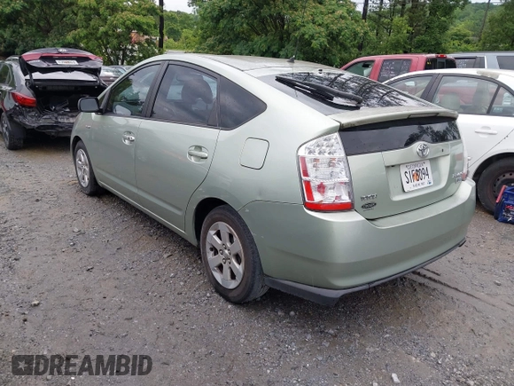 2007 Toyota Prius z VIN JTDKB20U077602951, wystawiony jako IAAI lot #42384098 z przebiegiem 169 136 mil mil oraz . Historia ofert i sprzedaży dostępna na DreamBid. Obrazek 3.