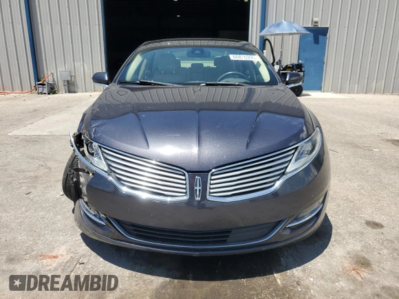 2013 Lincoln MKZ z VIN 3LN6L2GK4DR817557, wystawiony jako Copart lot #60876995 z przebiegiem 77 303 mil mil oraz Szkoda całkowita • Salvage title. Historia ofert i sprzedaży dostępna na DreamBid. Obrazek 5.