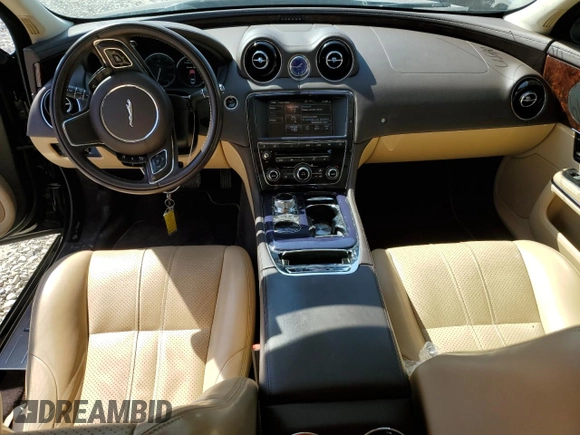 2012 Jaguar XJ with VIN SAJWA1CB5CLV29023, listed as a Copart auction lot 48300165 with 42,725 mi miles and Salvage title. Bid and sale history available at DreamBid. Image 8.