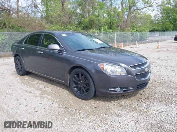 2012 Chevrolet Malibu LTZ with VIN 1G1ZG5E74CF297032, listed as a IAAI auction lot 42133482 with 82,682 mi miles and . Bid and sale history available at DreamBid. Image 1.