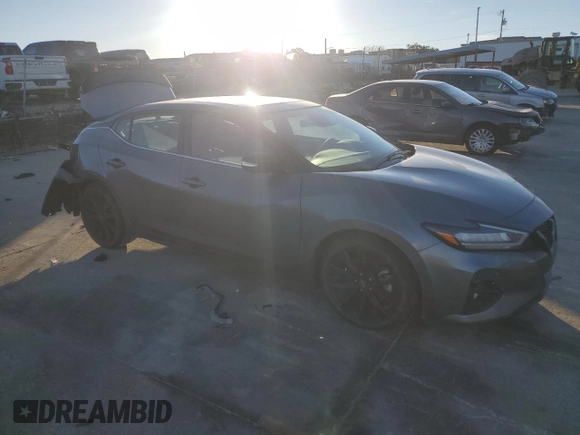 2023 Nissan Maxima SR with VIN 1N4AA6EV6PC513972, listed as a Copart auction lot 86695044 with 27,174 mi miles and Salvage title. Bid and sale history available at DreamBid. Image 4.