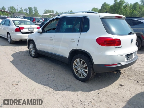2012 Volkswagen Tiguan SEL with VIN WVGAV7AX5CW517186, listed as a IAAI auction lot 42177269 with 142,285 mi miles and . Bid and sale history available at DreamBid. Image 3.