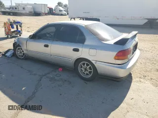 1998 Honda Civic LX z VIN 2HGEJ6576WH566858, wystawiony jako Copart lot #63260834 z przebiegiem 225 031 mil mil oraz Szkoda całkowita • Salvage title. Historia ofert i sprzedaży dostępna na DreamBid. Obrazek 2.