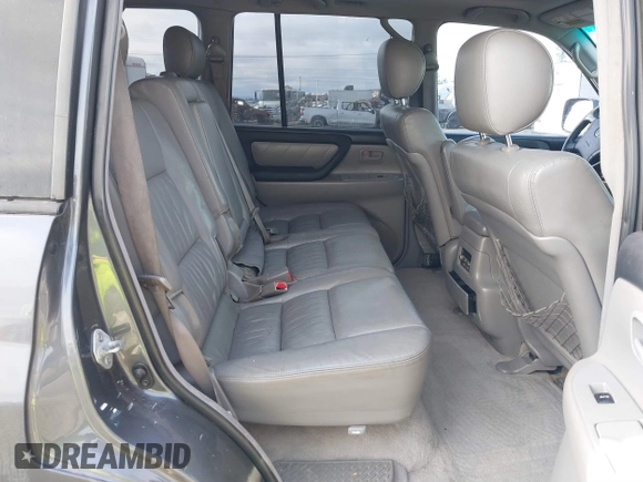 2005 Toyota Land Cruiser z VIN JTEHT05J852069392, wystawiony jako IAAI lot #41450782 z przebiegiem 187 949 mil mil oraz . Historia ofert i sprzedaży dostępna na DreamBid. Obrazek 8.