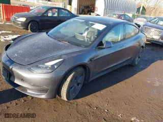 2023 Tesla Model 3 with VIN 5YJ3E1EA7PF509567, listed as a IAAI auction lot 41422396 with 28,914 mi miles. Bid and sale history available at carsss.com. Image 2.