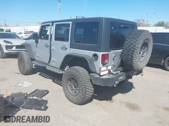 2012 Jeep Wrangler Unlimited Sport with VIN 1C4BJWDG8CL270788, listed as a IAAI auction lot 41758929 with 138,935 mi miles. Bid and sale history available at carsss.com. Image 3.