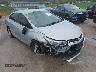 2018 Chevrolet Cruze LS with VIN 1G1BC5SM5J7126160, listed as a IAAI auction lot 42061395 with 145,098 mi miles and . Bid and sale history available at DreamBid. Image 6.