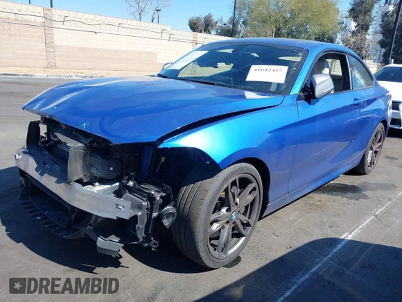 2015 BMW 2 Series M235i with VIN WBA1J7C59FV254140, listed as a IAAI auction lot 41642427 with 23,957 mi miles and . Bid and sale history available at carsss.com. Image 18.