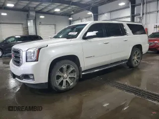2016 GMC Yukon XL SLT with VIN 1GKS2GKC8GR136535, listed as a Copart auction lot 61625595 with 144,440 mi miles and Salvage title. Bid and sale history available at DreamBid. Image 1.