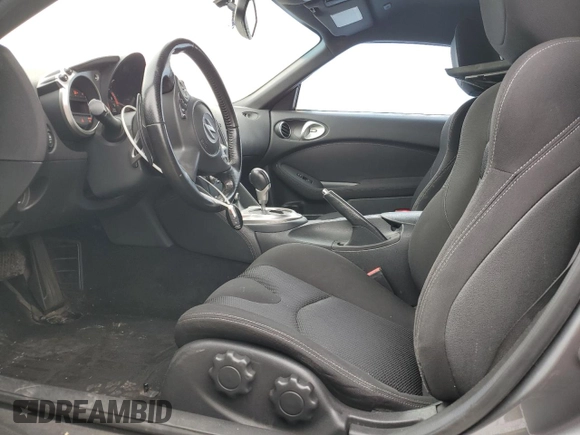 2016 Nissan 370Z Sport с VIN JN1AZ4EH3GM936250, выставлен на аукционе Copart как лот 44227205 с пробегом Не указан миль и Списание • Salvage title. История ставок и продаж доступна на DreamBid. Изображение 7.