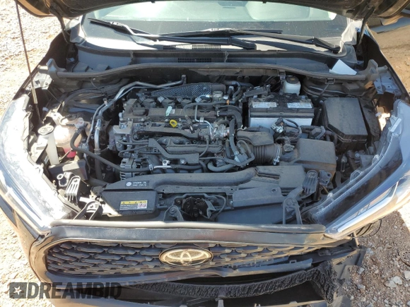 2023 Toyota Corolla Cross LE with VIN 7MUCAAAG3PV058094, listed as a Copart auction lot 57983105 with 30,593 mi miles and Salvage title. Bid and sale history available at DreamBid. Image 12.