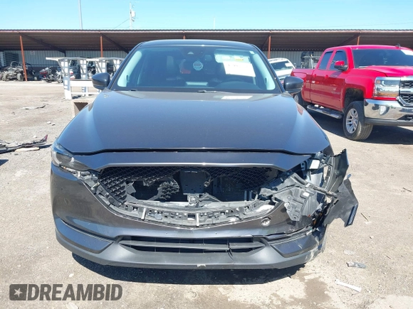 2017 Mazda CX-5 Grand Touring with VIN JM3KFBDLXH0225634, listed as a IAAI auction lot 42092029 with 86,373 mi miles and . Bid and sale history available at carsss.com. Image 12.
