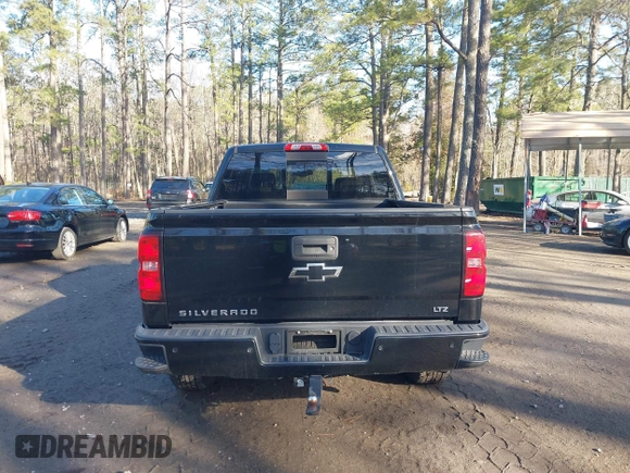 2015 Chevrolet Silverado 1500 LTZ with VIN 3GCUKSEC0FG497341, listed as a IAAI auction lot 41829608 with 96,805 mi miles. Bid and sale history available at carsss.com. Image 16.