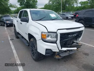 2021 GMC Canyon 2WD Elevation Standard with VIN 1GTG5BEN2M1292797, listed as a IAAI auction lot 42388638 with 84,585 mi miles and . Bid and sale history available at DreamBid. Image 1.
