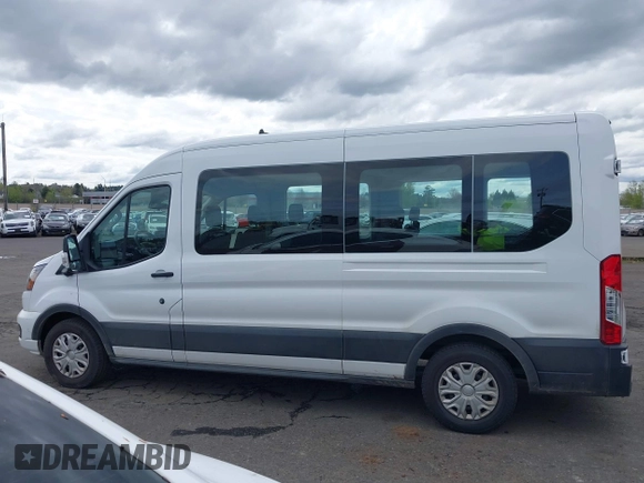 2023 Ford Transit Passenger XL with VIN 1FBAX2C80PKA94008, listed as a IAAI auction lot 42007461 with 35,553 mi miles and . Bid and sale history available at DreamBid. Image 14.