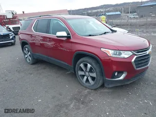 2019 Chevrolet Traverse LT Leather with VIN 1GNEVHKW1KJ164692, listed as a IAAI auction lot 41800874 with 76,866 mi miles. Bid and sale history available at carsss.com. Image 1.