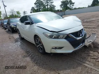 2016 Nissan Maxima Platinum z VIN 1N4AA6AP7GC429487, wystawiony jako IAAI lot #41923251 z przebiegiem 104 534 mil mil oraz . Historia ofert i sprzedaży dostępna na DreamBid. Obrazek 1.
