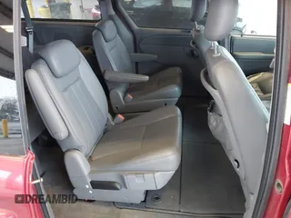 2005 Dodge Caravan SXT with VIN 2D4GP44LX5R210076, listed as a IAAI auction lot 41856927 with 291,712 mi miles and . Bid and sale history available at carsss.com. Image 8.