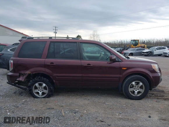 2007 Honda Pilot EX-L with VIN 2HKYF18687H512182, listed as a IAAI auction lot 41898954 with 181,701 mi miles and . Bid and sale history available at DreamBid. Image 13.