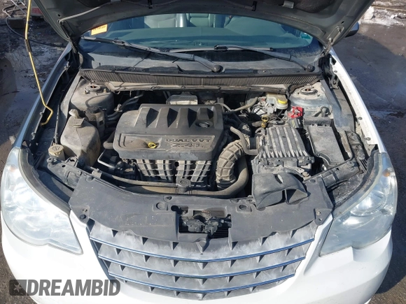 2008 Chrysler Sebring with VIN 1C3LC66J18N243827, listed as a IAAI auction lot 41642713 with 231,682 mi miles and . Bid and sale history available at DreamBid. Image 10.