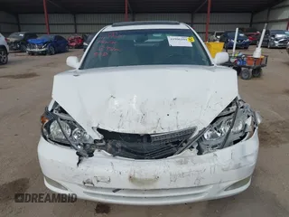 2003 Toyota Camry LE with VIN 4T1BE32K13U250477, listed as a IAAI auction lot 41996101 with 212,951 mi miles and . Bid and sale history available at DreamBid. Image 12.